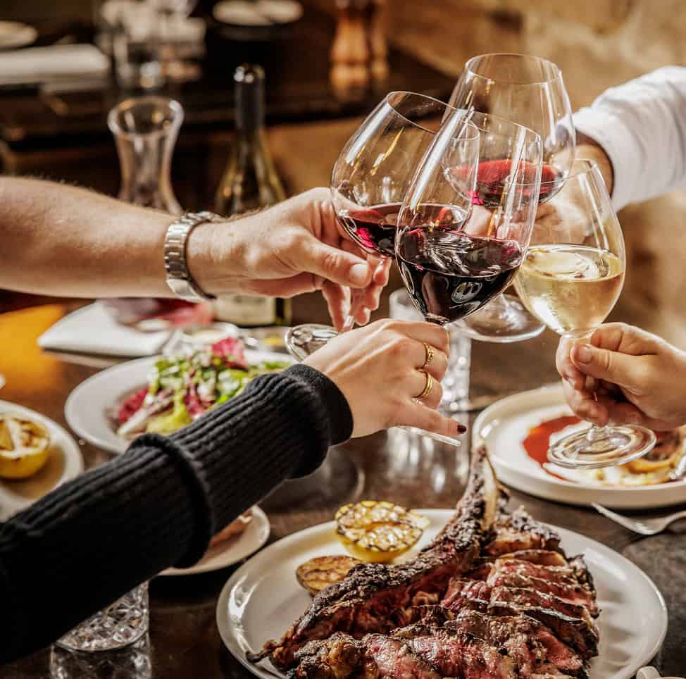 Celebrating with wine. Cheers at Kingsleys